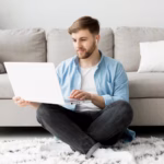 young-man-floor-with-laptop_23-2148560415